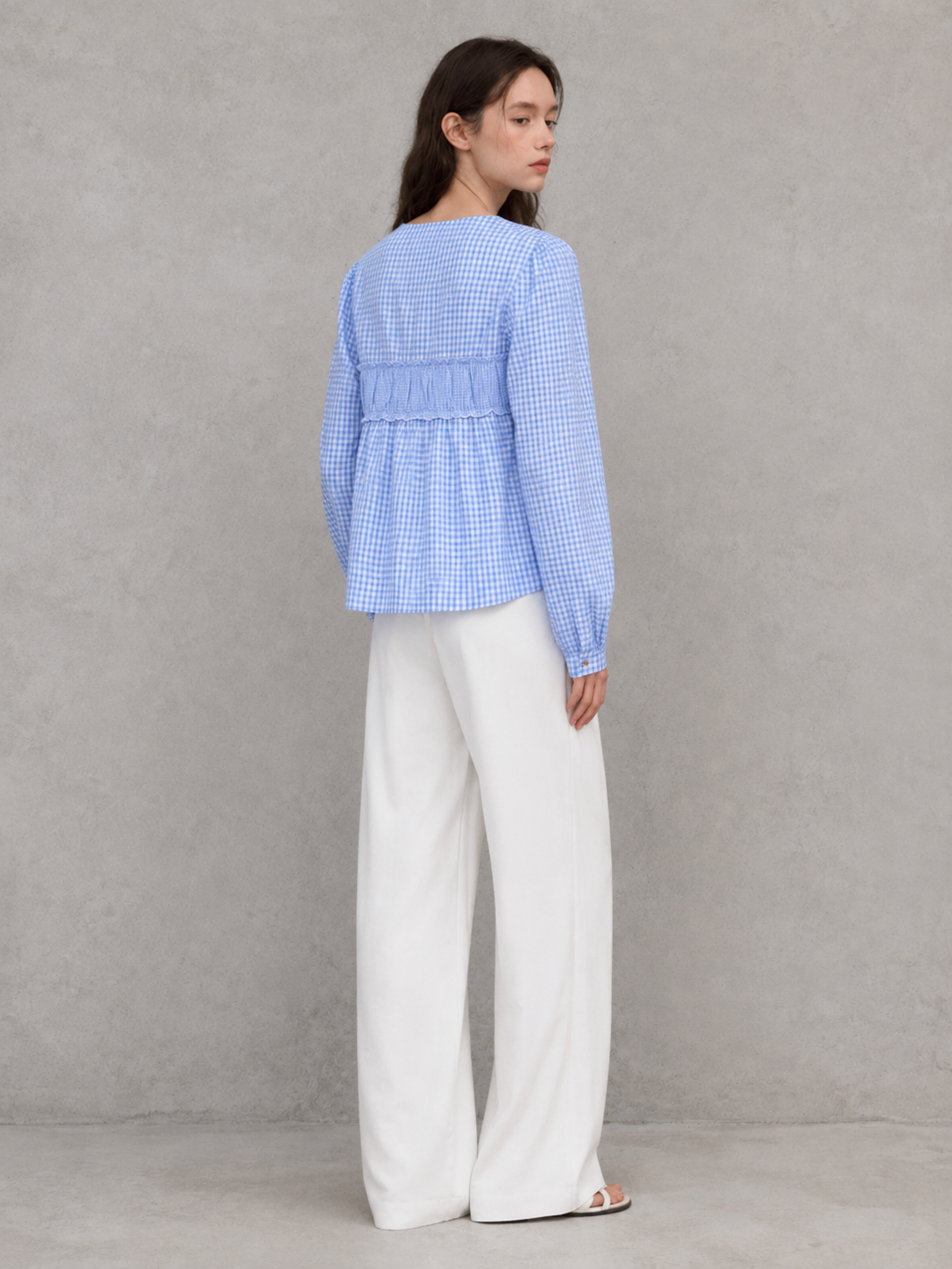 Light blue plaid V-neck long-sleeved top with front tie details